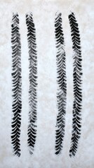 Tire tracks on snow creating an abstract art piece with space for branding to promote winter driving safety