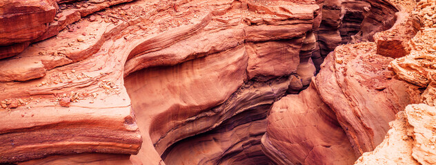 Desert nature landscape. Stone texture. Red canyon in the desert. Abstract stone nature background. Israel. Desert nature landscape. Stone texture. Horizontal banner