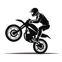 silhouette of a biker doing freestyle tricks