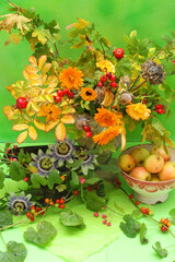 Autumn still life of flowers and fruit 