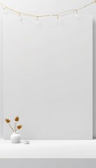 Minimalist white backdrop with string lights and vase with dried leaves.