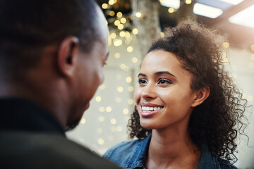 Happy couple, smile and love on date for romance, relationship and connection with bonding on weekend. Man, woman and together for anniversary, valentines day and care with partner, trust and support