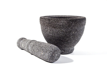 Traditional stone pestle and  mortar, usually used to pound cooking spices, or herbs to mix medicine.