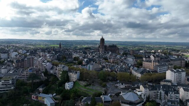 Historic Rodez cathedral rising above a bustling city center