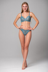 Fototapeta premium portrait of sexy woman with perfect body in lingerie
