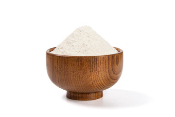White flour in wood bowl isolated on white background