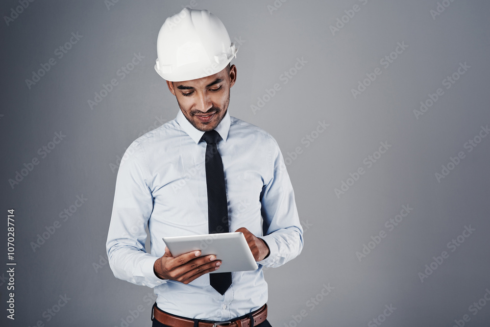 Poster engineer, tablet and construction worker with digital research and online blueprint in studio. contr