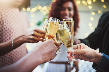 Hands, group and friends with champagne toast for social reunion, holiday success and New Years...