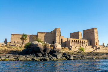 View of the ancient Philae temple from the Nile river in Aswan, Egypt