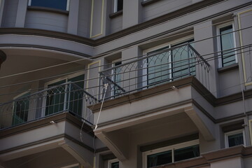 Detailed view of windows, doors and balconies of city buildings 