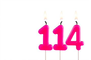 Pink number 114 birthday candle on white background