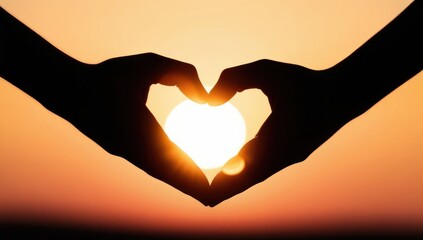 Fototapeta premium Hands in heart shape with sun rise background, love concept