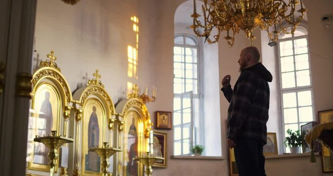 Man engaged in deep reflection within a sacred space while on his significant spiritual journey focused on personal growth and enlightenment, seeking inner peace and connection with higher faith