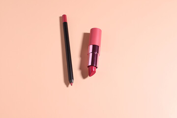 Lip make up cosmetic, lipstick and pencil, minimalistic style, beauty concept