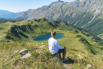 person on the top of a mountain