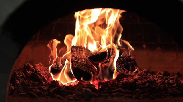 Fire over wood in stove, beautiful flame