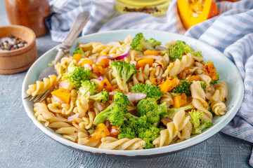Pumpkin and broccoli vegan warm pasta salad
