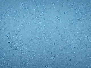 Obraz premium Water spray and dew drops on blue background