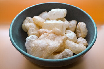 a bowl of kerupuk kulit, Indonesian traditional snack