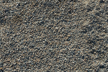 Background with texture of pebbles, small gravel raw material in the manufacture of concrete.
