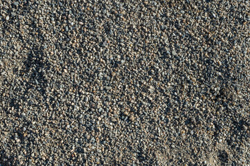 Background with texture of pebbles, small gravel raw material in the manufacture of concrete.