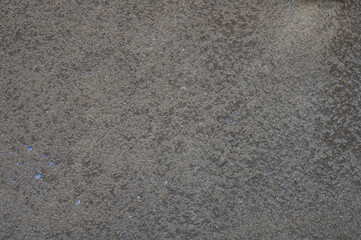 Texture of a wall with old gray plaster 