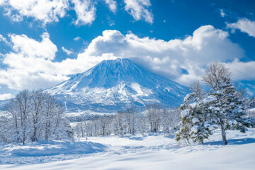 Winter Wonderland: Snow-Covered Mountain with Blue Sky