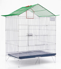 Metal cage for birds on white isolated background with copy space.