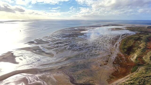 Aerial drone film of tidal sea Wadden with sandbank on Terschelling