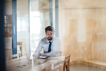 Planning, portrait and tablet with business man for chief financial officer, corporate and annual...