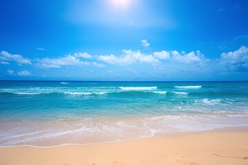 Obraz premium A pristine beach with golden sand leading up to the azure waters of the ocean