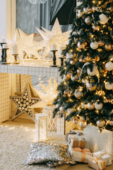 Christmas interior in a luxurious golden style with garlands in the form of stars and a mirror. Background for New Year wallpapers and postcards.