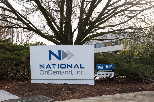 BURLINGTON, NC, USA-2 JAN 2023: National  OnDemand, Inc. monument sign with building behind.