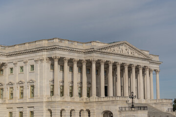 Senate Wing of the US Capitol Complex with blue sky background