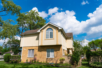 Property in neighborhood. Residential neighborhood house in developed area. Property insurance and real estate. Suburban neighborhood. Private property house. House insurance. Private life