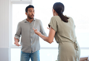 Frustrated couple, argument and fight with conflict for disagreement, accusation or cheating affair at home. Angry, man and woman in toxic relationship or dispute for breakup, divorce or separation