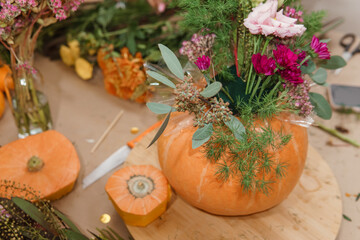 Creating a floral composition in a pumpkin. Making decor with your own hands.