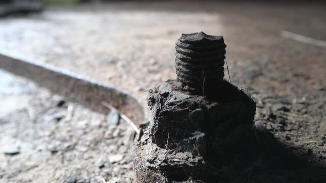 Old rusted screw, maintenance backlog