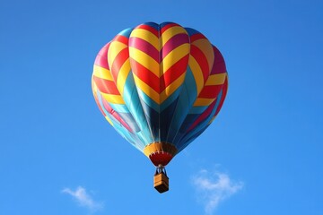 Naklejka premium A colorful hot air balloon ascending into a bright blue sky, symbolizing freedom, creativity, and the achievement of new heights.