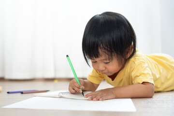Happy children playing learning paint on paper. Activity, development, IQ, EQ, meditation, brain, muscles, essential skills, family having fun spending time together. Holiday.