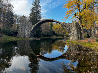 Devil's bridge, Rakotzbrücke, Germany, reflection in autumn