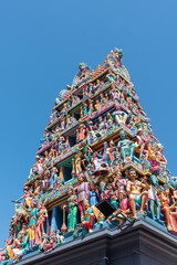Tower Fully Decorated With Hindu Deities On A Hindu Temple In The Chinatown District In Singapore