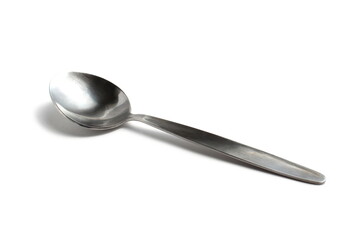Iron gray spoon lies on a white isolated background.