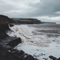 Fototapeta premium waves crashing on rocks