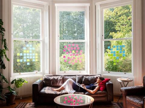 Woman brainstorming while working from home