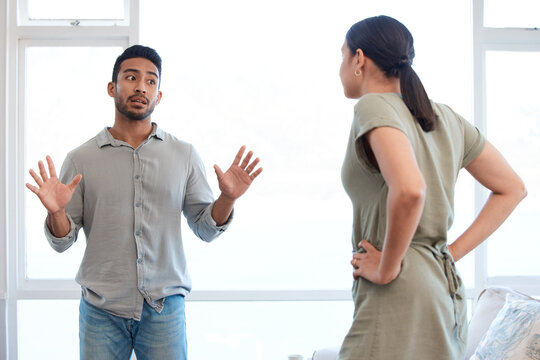 Frustrated couple, disagreement and fight with conflict for cheating affair, argument or accusation at home. Upset, man and woman in toxic relationship or dispute for breakup, divorce or separation