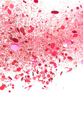 Pink confetti falling against black