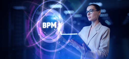 BPM Business process management. Automation technology concept. Businesswoman pointing on virtual screen.