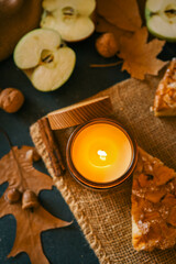 Candle and homemade apple pie, autumn mood
