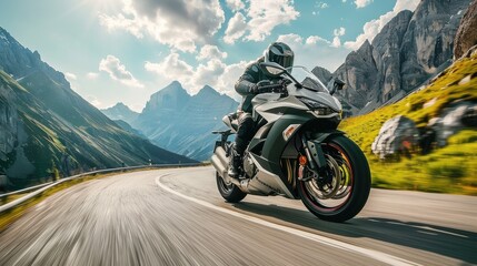 A superbike racing along a mountain pass, surrounded by dramatic cliffs and peaks